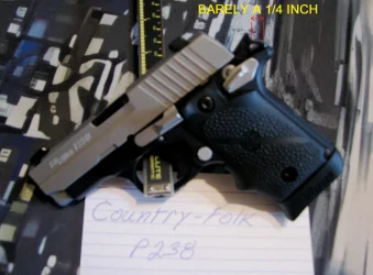 My P238 (Hammer Cocked) Edited.webp